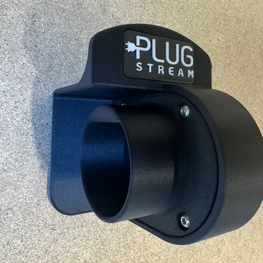 Close-up of the compact PlugStream Dock cable holder